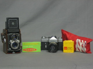 A YashicaFlex camera and various other photographic equipment and cameras used by Ted Bilsdon late of British Pathe Mirror Group Newspapers etc