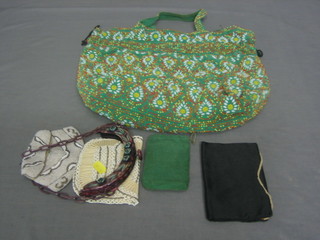 A green beadwork bag, 2 white evening bags and a black silk bag containing a sewing kit