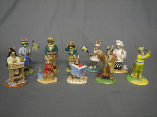 10 various Royal Doulton Bunnykins figures - Boy Scout, Scout Leader, Pilot, Chef, William Read Tears, Guide Leader, William Listening Intently, Deuce Tennis, Sister Mary Barbara and On The Fairway - Golfer