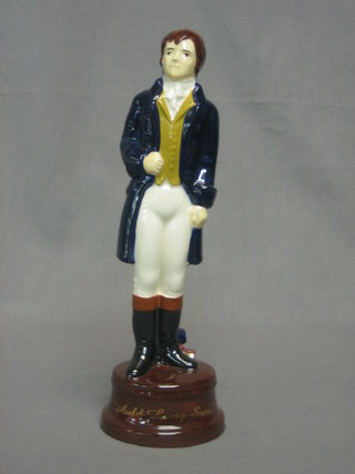 A Wade figure of a seated brown kitten 4"  and a Wade Special Millennium edition figure of Robbie Byrnes 8"