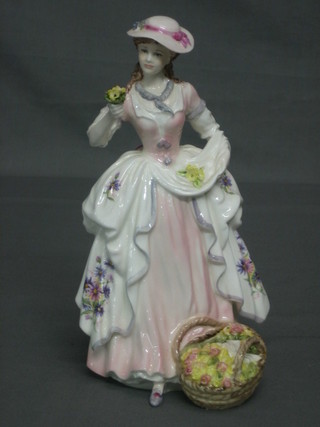 A Coalport limited edition figure - The Flower Seller 1993