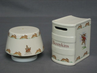 A Beswick Bunnykins money box in the form of a book together with a circular mushroom shaped musical box