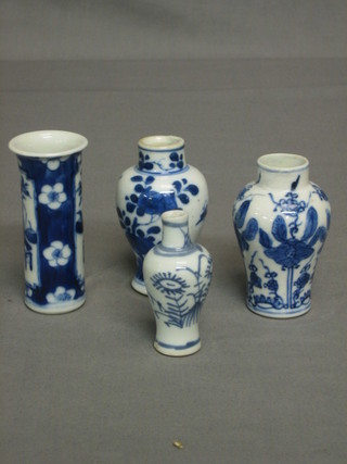 A miniature Oriental blue and white rolleau vase 3" together with 3 other miniature vases
