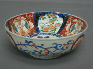 A 19th Century Japanese circular Imari porcelain bowl with panelled decoration 8 1/2"