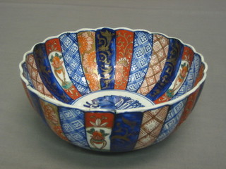 A  19th Century Japanese Imari porcelain lobed shaped bowl with floral decoration (cracked) 9"