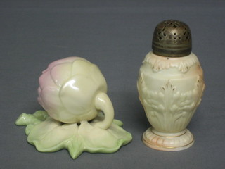 A Victorian Royal Worcester wall pocket in the form of a flower head, the reverse with green Worcester mark and 12 dots, marked 107 together with a Locke & Co Worcester blush ivory pepper pot (2)