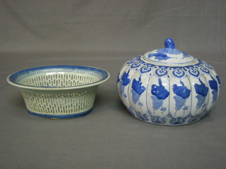 A circular pierced blue and white dish 8" and a blue and white bowl