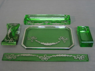 A handsome green glass and inlaid silver 5 piece desk set comprising: lozenge shaped tray 8", straight edge 12", rectangular dish 9" (chipped), blotter 5" and dish 4"