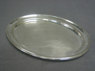 A pair of oval silver plated meat plates 16"