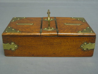 A rectangular oak and silver plated twin section cigar box with hinged lid 10"