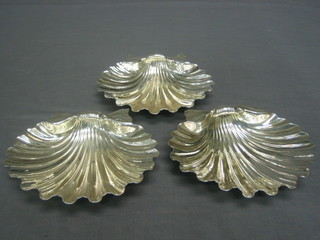 A handsome set of 3 William IV silver scallop shaped butter dishes, raised on scallop shaped feet, by Matthew Bolton, Birmingham 1830 17 ozs