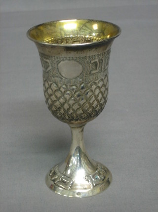 A Continental embossed silver goblet with Hebrew script, 1 ozs