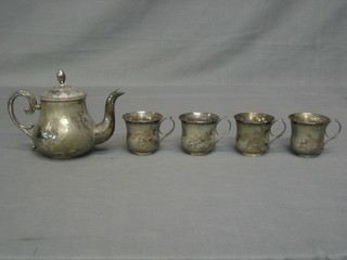 An engraved Chinese silver 5 piece tea service comprising teapot and 4 cups, all with planished engraved decoration 16 ozs