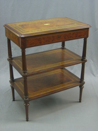 A 19th Century Continental rectangular inlaid mahogany 3 tier what-not, the top inlaid figured walnut and fitted a drawer, raised on turned and reeded supports 27"