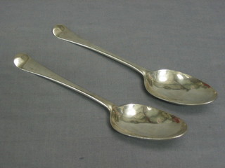 A pair of antique silver bottom marked spoons, 4 ozs 
