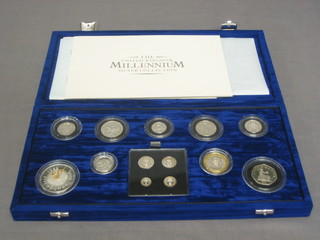 A Royal Mint Millennium silver proof set of coins including a 2000 Maundy set