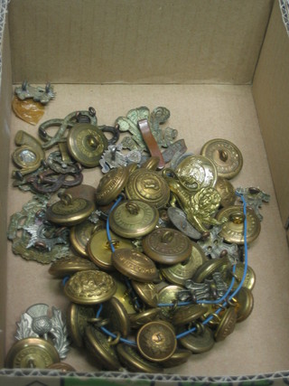 A collection of various military buttons etc