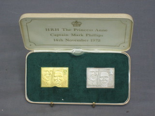 A 22ct gold ingot to commemorate the marriage of HRH Princess Anne and Captain Mark Phillips together with a silver ditto