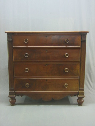 A Victorian mahogany chest of 4 long drawers with column decoration to the side and tore handles 44"