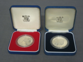 A 1977 Silver Jubilee Crown together with a 1981 Charles and Diana silver crown