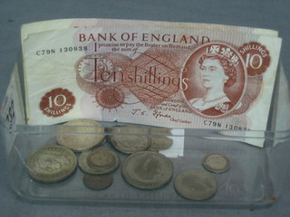 2 10 shilling notes and a collection of various silver coins