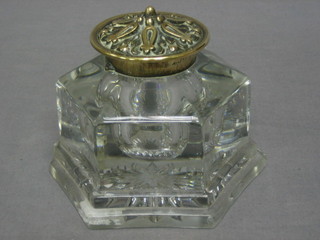 A large Victorian octagonal glass inkwell with gilt metal lid 4 1/2" (chip to base)