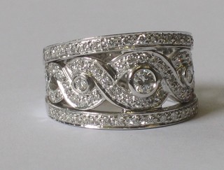 An 18ct white gold pierced cocktail dress ring