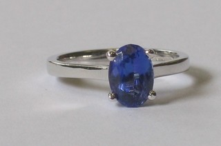 An 18ct white gold dress ring set a single stone tanzanite