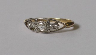 An 18ct gold dress ring set diamonds