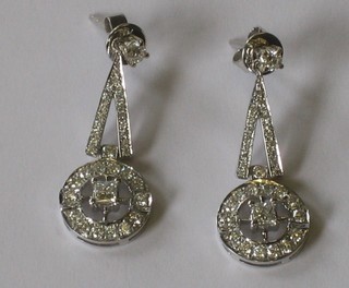 A pair of diamond pendant drop earrings