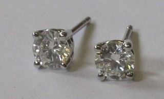 A pair of diamond ear studs