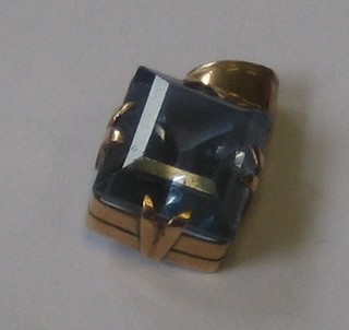 A 14ct gold pendant set a rectangular cut aquamarine