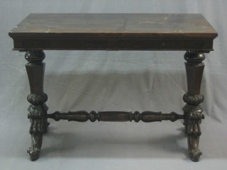 A rectangular Victorian mahogany stretcher table, raised on chamfered supports united by an H framed stretcher 41"
