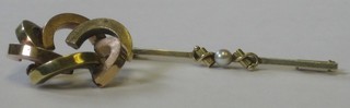 A 14ct gold circular brooch together with a gold bar brooch set a pearl