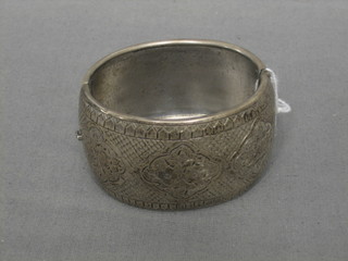 An engraved silver bracelet