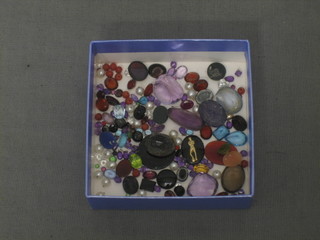 A collection of various unmounted stones