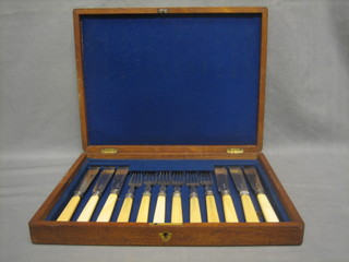 A set of 6 silver plated fish knives and forks cased