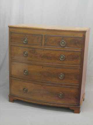A 19th Century bleached mahogany bow front chest of 2 short and 3 long drawers, raised on bracket feet 38"