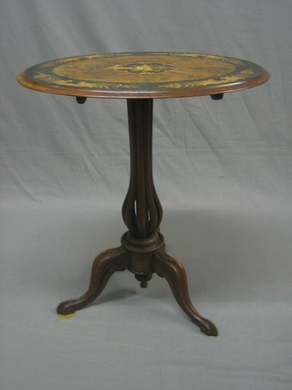 A 19th Century Continental oval walnut wine table with inlaid floral decoration, raised on a carved column and tripod base 24"