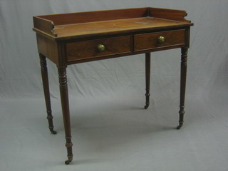 A William IV mahogany wash stand with three-quarter gallery fitted 2 drawers raised on turned supports 37"