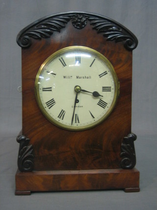 A William IV fusee bracket clock, the 7" circular painted dial with Roman numerals marked William Marshall London, contained in an arch shaped carved mahogany case