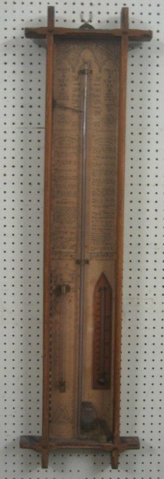 A 19th Century Admiral Fitzroy barometer contained in a bleached oak case
