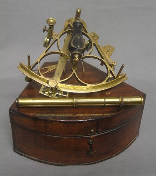 A 19th Century pierced brass sextant marked 20377 contained in a mahogany case, labelled D McGregor & Co