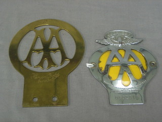 A replica pierced brass AA badge marked Stenson Cooke, together with a Guernsey badge