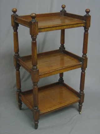 A Victorian rectangular mahogany 3 tier buffet raised on turned and block supports 21"