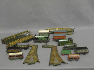 2 clockwork tank engines, a collection of rolling stock and rails