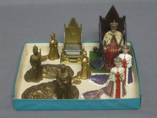 A metal model of King George VI seated on the throne 4" and 6 metal models of Queen Elizabeth