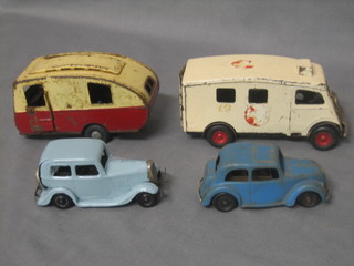 A Minic clockwork model ambulance (no key), a do. Caravan and 2 do. clockwork keys (no keys)
