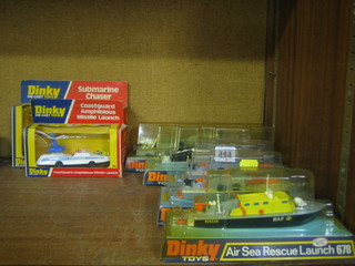5 Dinky model boats no 671, 672, 675 and 678 together with a Dinky Submarine Chaser no. 673 and a Coast guard amphibious missile launch