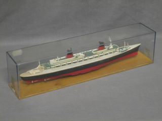 A plastic model of The SS France 16" contained in a plastic case